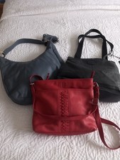 3 All Leather Handbags. One Grey, One Red and One Black.