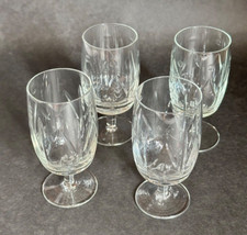 Four small sherry/wine glasses