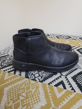 All Black Skechers On The Go