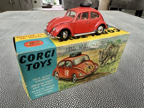 Corgi beetle red with - corgi,