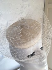 cream fascinator hat