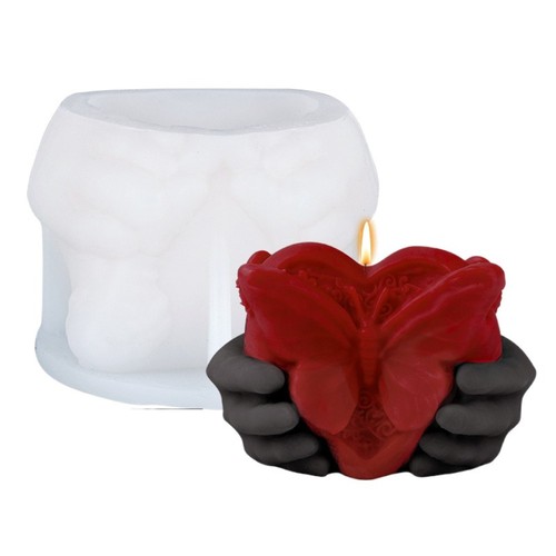 Hand holding heart mold - hand,