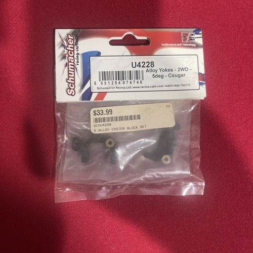 Schumacher alloy yokes 2wd - schumacher,