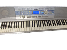 Yamaha Portable Grand DGX-200 Electronic Keyboard with stand