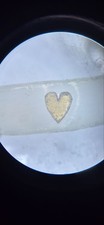 Micro Sculpture. Heart on rice