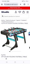 foosball table black white and blue height is 4ft excellent condition barely use