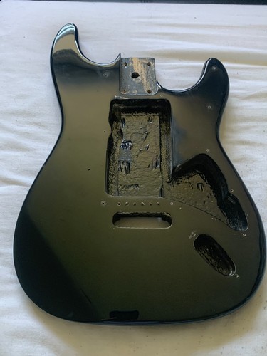 Black used electric - used, guitar
