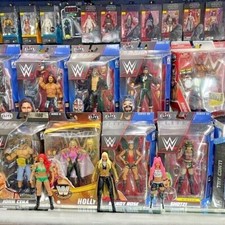 Various BOXED WWE Figures