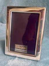 Carrs of sheffield modern design sterling silver photo frame with navy back.