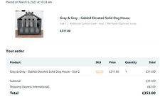 Premium dog house from American brand WLO, has a gray exterior and soft cushion.