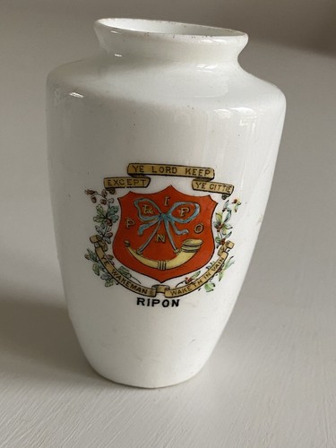 Crested miniature vase