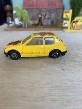 MC Toy Peugeot 205 GTI in Yellow - 1:64 Scale Used Condition