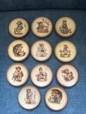 Hummel collection of 12 small plates/dishes