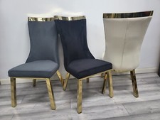 Elegant Golden Tone Chairs