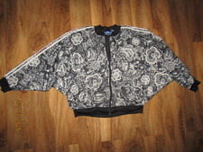 Adidas Florido Cape bat wing