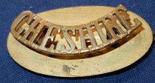 WW2 ERA THE CHESHIRE REGIMENT BRITISH MILITARY BRASS SHOULDER TITLE BADGE