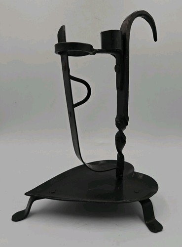 Antique wrought iron candle - antique?,
