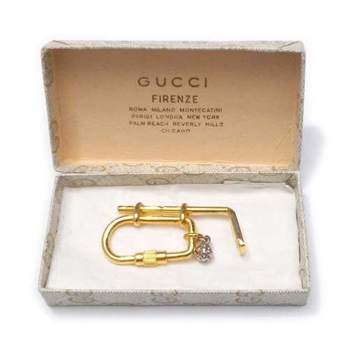 Gucci golf club and - and, motif