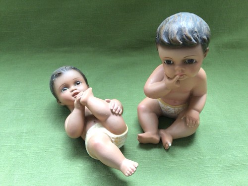Two piano baby figurines - two,
