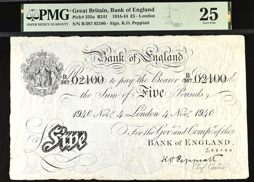 White five pound bank - five,