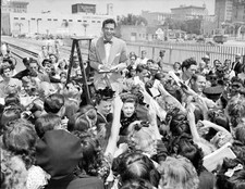 Frank Sinatra stands on a