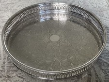 A Vintage Round Silver Plated Gallery Tray. Chased Decoration. Cavalier England.