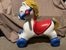1960s Child's ride on horse on