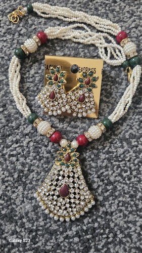 Earrings with necklace piece - with,