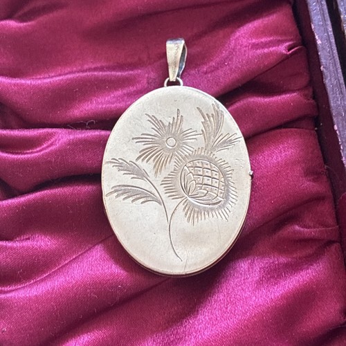 Large 9ct rolled - gold, locket