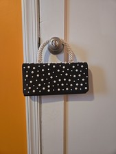 Black and Pearl Wedding Guest