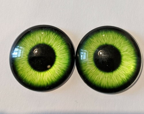 Green glass cabachon eyes