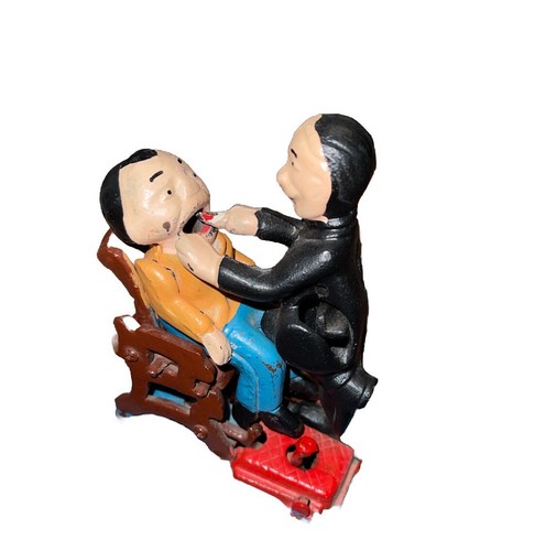 Vintage cast iron the dentist - the,