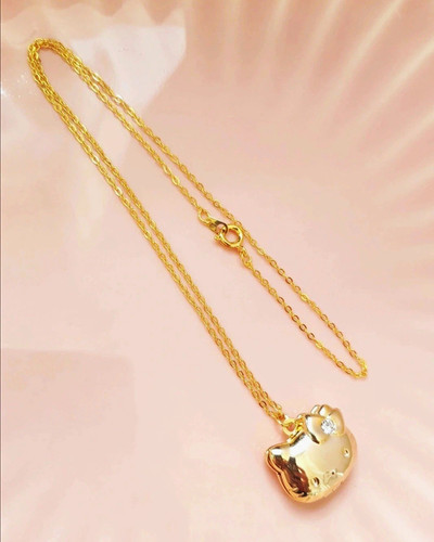 Hello kitty gold coloured - kitty,