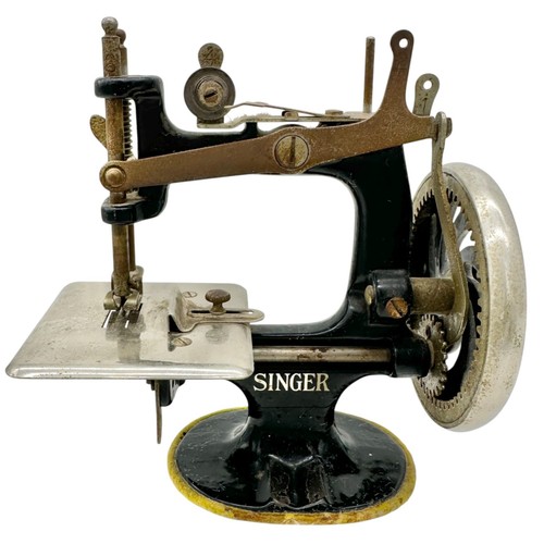 Antique toy singer - antique,