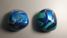 A Pair Of Siddy Langley Pebble Paperweights 2003 Iridescent Studio Glass.