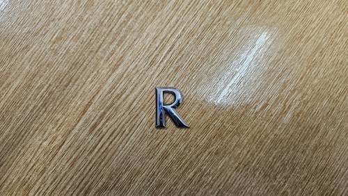 Genuine aston martin - badge, "r"