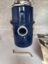 Insinkerator model 333 1/2HP new old stock in really tatty box no outlet pipe