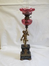 Antique ruby glass peg oil lamp with bronze Putti marble base