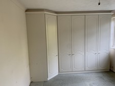 2x double + corner unit wardrobes, + corner dressing unit, + 2x bedside drawers