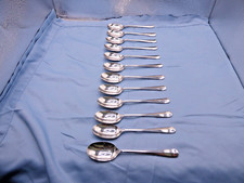 A VINTAGE SET OF 12 STERLING
