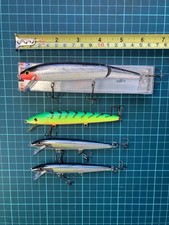 Three Rapala Lures And One Storm Lure