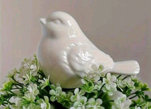 White ceramic bird - x,
