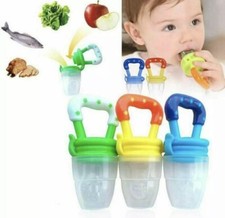 Baby feeding dummy nibbles - feeding,