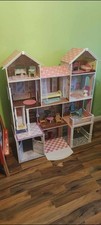 Kids wooden dolls house with furniture and lift. 4 storey. 