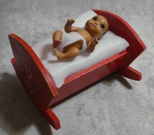 RED WOODEN ROCKING CRIB &