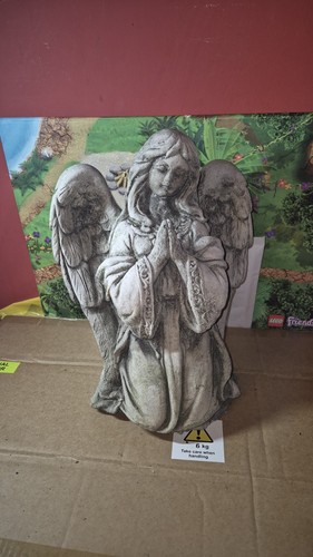 Angel standing grave