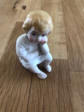small victorian bisque figure of a thinking child