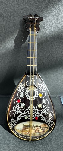 Vintage mandolin shaped wind - shaped,