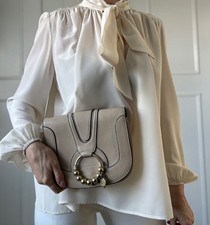 See By Chloe Small Beige Leather Clutch bag strap can be added