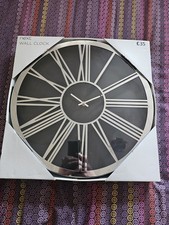 Next Silver and Black Wall